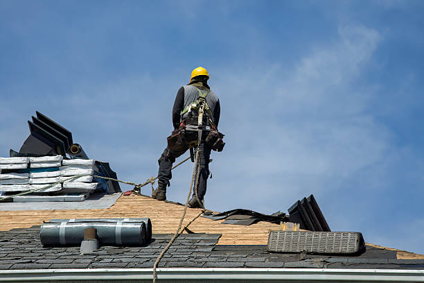 Professional Roof Replacement technician working in Bighorn, MT